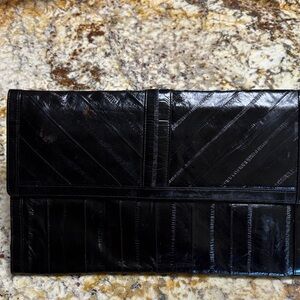 Black EEL SKIN CLUTCH.